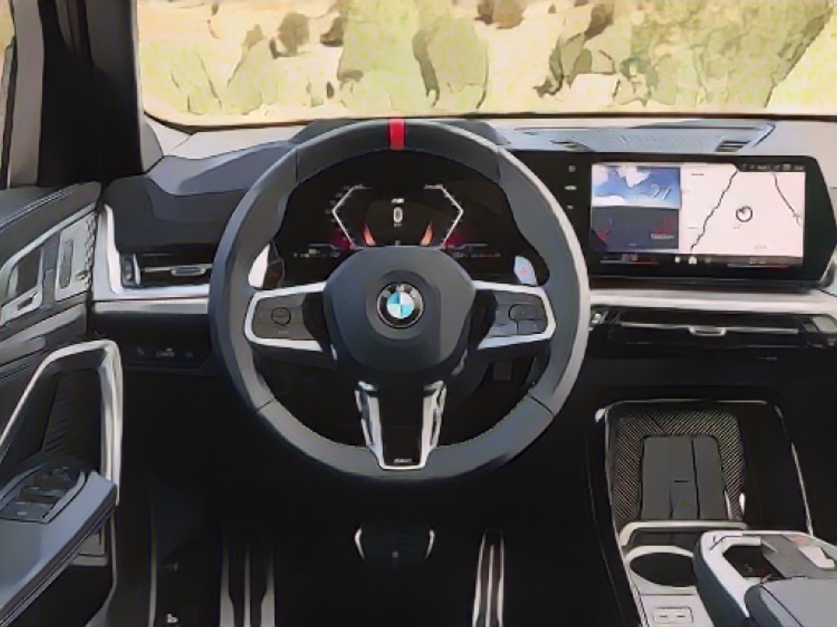 В наши дни ничто не обходится в BMW без изогнутого дисплея.