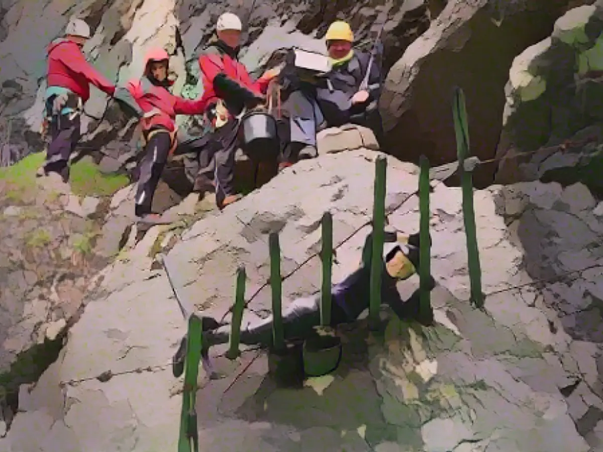 Heroes at work: The mountain rescue team joining Heidi in action Crew of heroes: The real deals in action