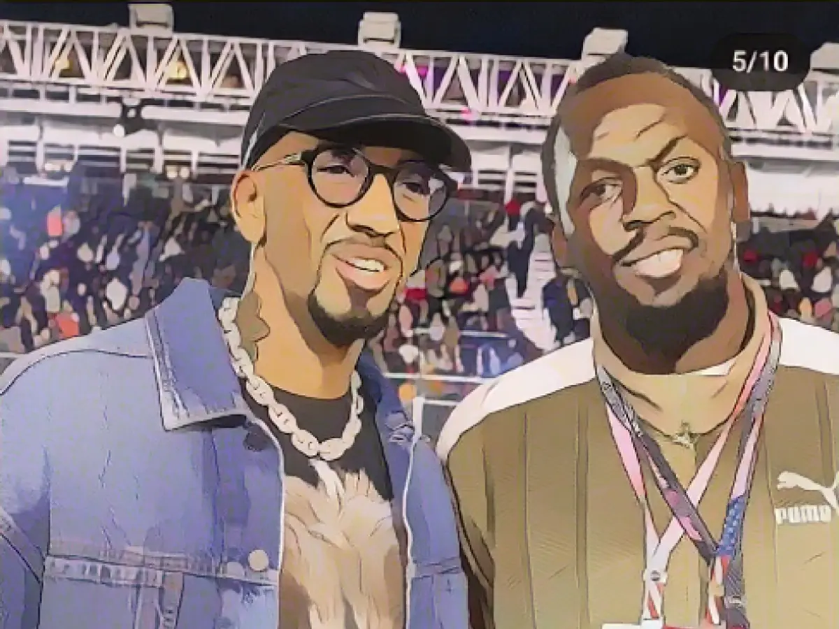 Boateng with sprinter legend Usain Bolt Boateng with sprinter legend Usain Bolt