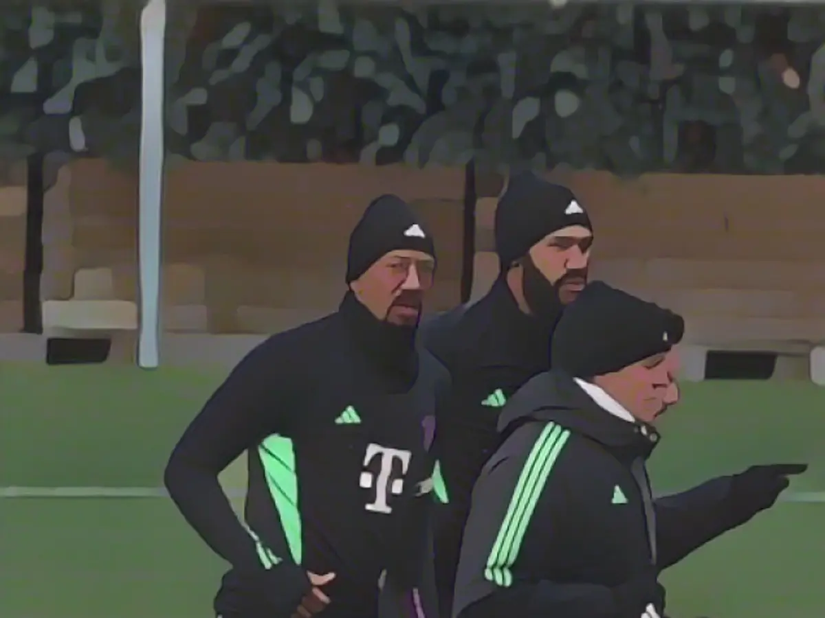 Boateng alongside Eric Maxim Choupo-Moting during Bayern training on Wednesday Boateng alongside Eric Maxim Choupo-Moting during Bayern training on Wednesday