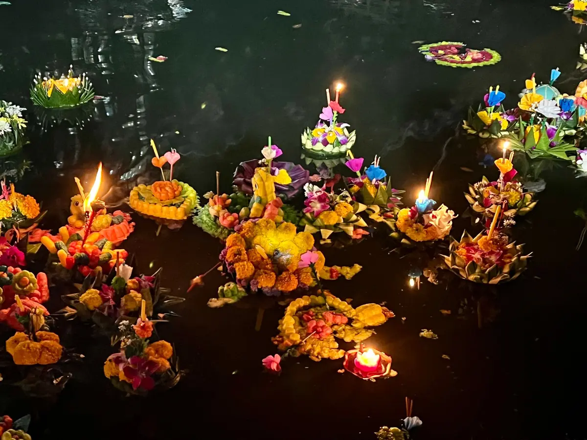 Krathongs swim in a lake in Lumphini Park, one of Bangkok's largest parks.