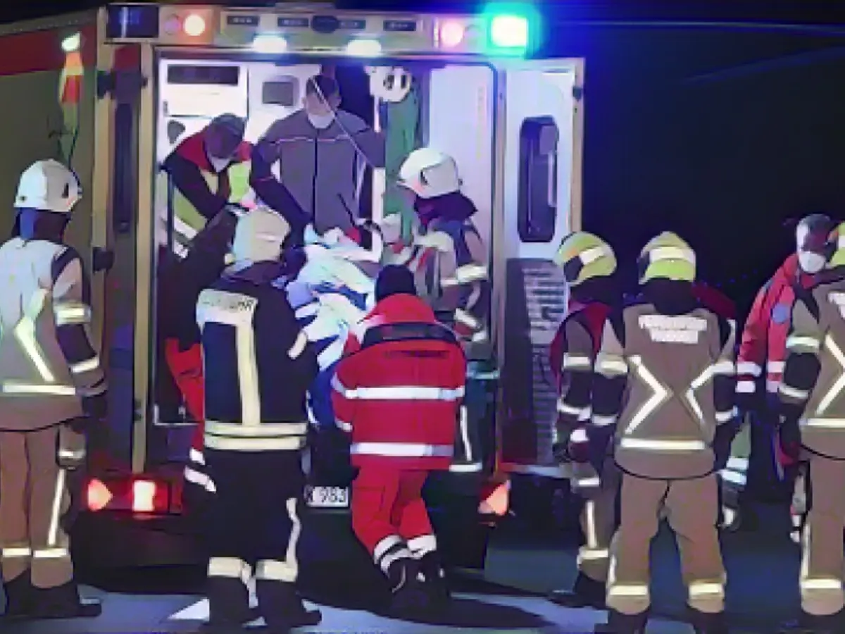 Emergency services respond to the scene of the accident Emergency services respond to the scene of the accident
