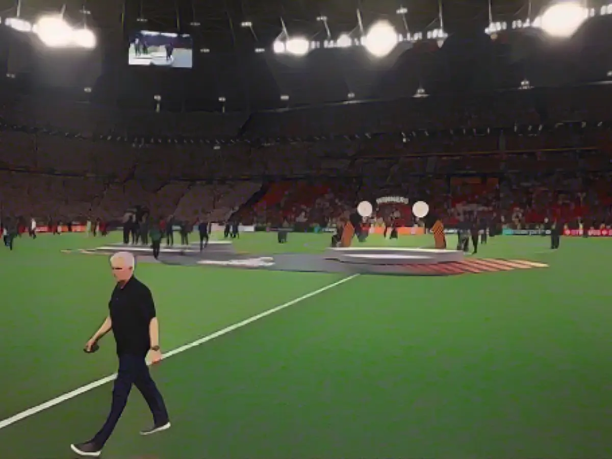 Mourinho leaves the pitch at the end of the Europa League final.