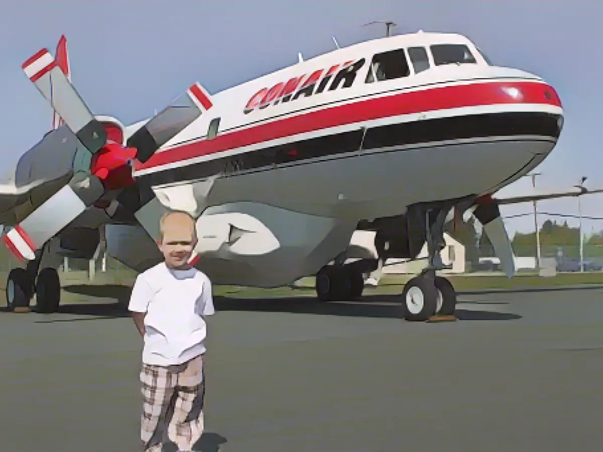 Aerni tracked down the aircraft and recreated the 1976 photograph with his young son.