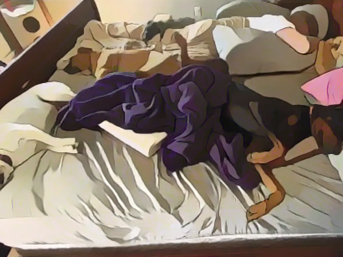 Whether it's spreading out in bed or having your favorite spot, anything is better as long as it allows you to relax and unwind. Here's The Beast (lower right), a 106-pound European Dobermann, with his sisters Buttercup and Bear (counterclockwise from lower left) and his brother Joey, snoozing on top of him; and Bailey, his sister. Whether it's spreading out in bed or having your favorite spot, anything is better as long as it allows you to relax and unwind. Here's The Beast (lower right), a 106-pound European Dobermann, with his sisters Buttercup and Bear (counterclockwise from lower left) and his brother Joey, snoozing on top of him; and Bailey, his sister.