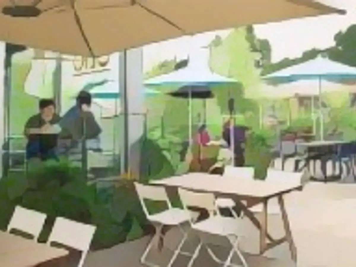 A customer enjoying a meal outdoors in St. Louis, Missouri, USA