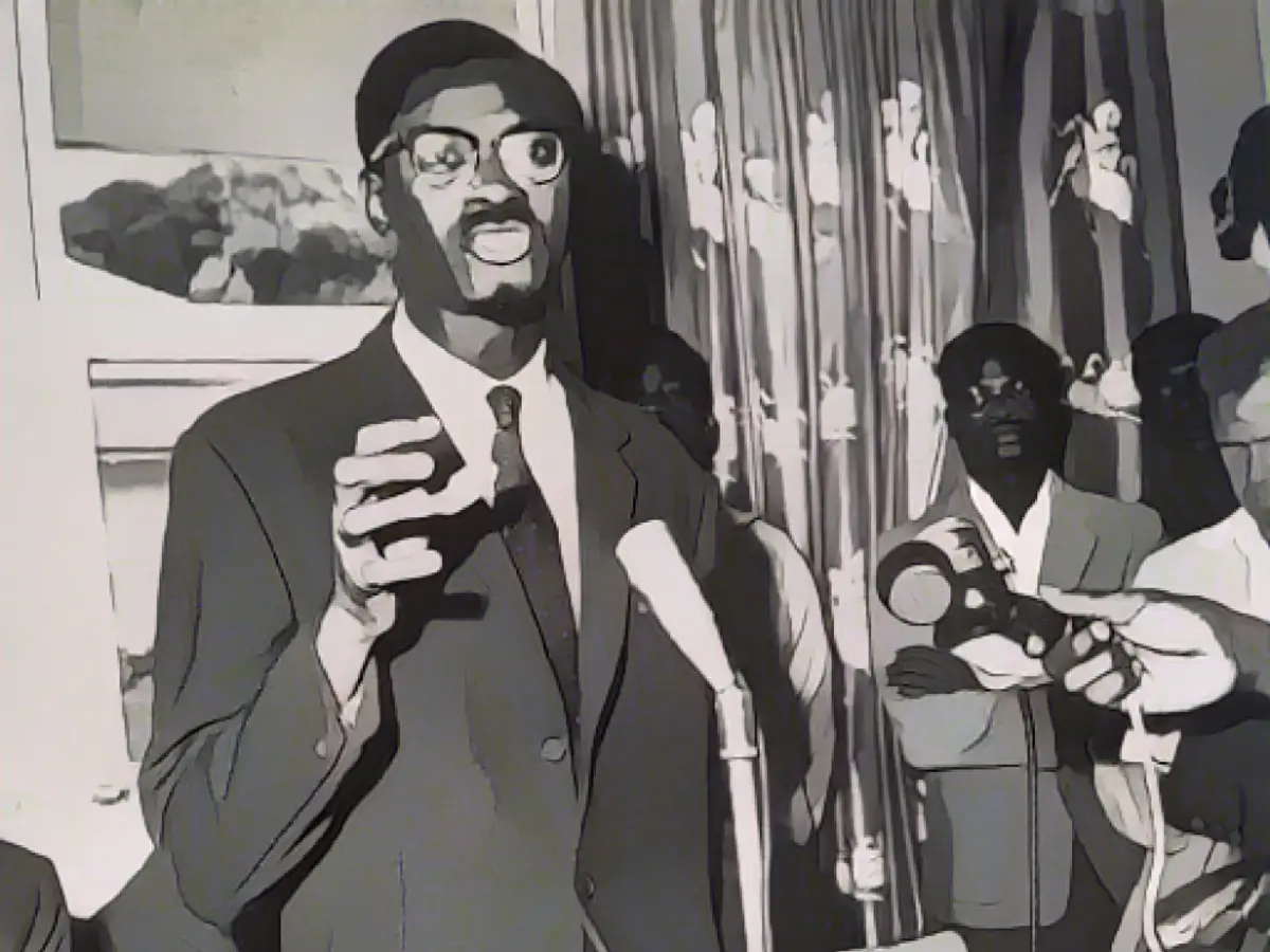 A committed and visionary leader, Patrice Émery Lumumba, at a press conference in 1960, served as Congo's first prime minister
