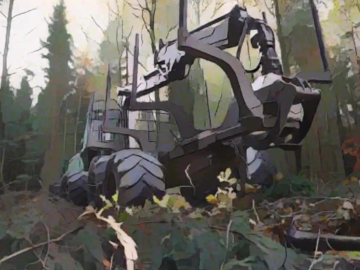 A tree harvester consumes its way through the whale A tree harvester consumes its way through the forest