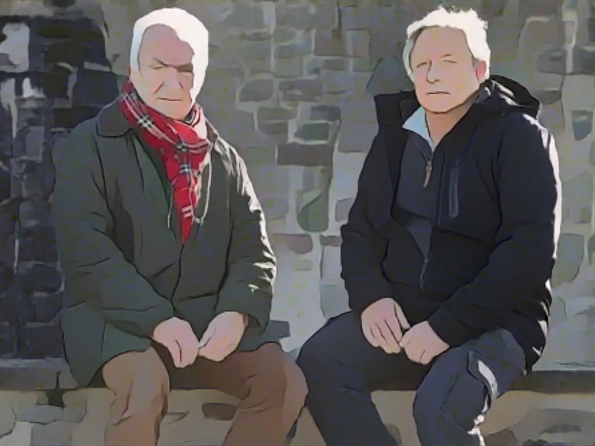Former presiding judge Ottmar Barke (71) attends a protest with local resident Oliver Penner (57) Former presiding judge Ottmar Barke (71) attends a protest with local resident Oliver Penner (57)