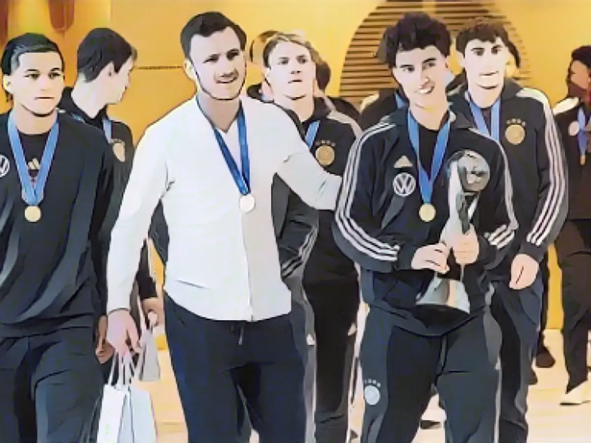 U17 World Cup champs welcomed home with trophy