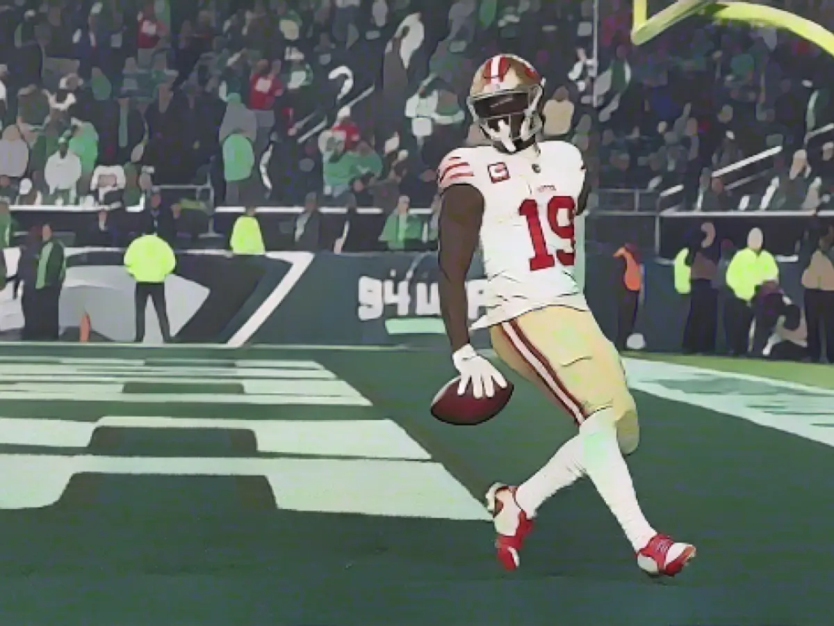 Samuel celebrates after scoring a touchdown late in the game against the Eagles.