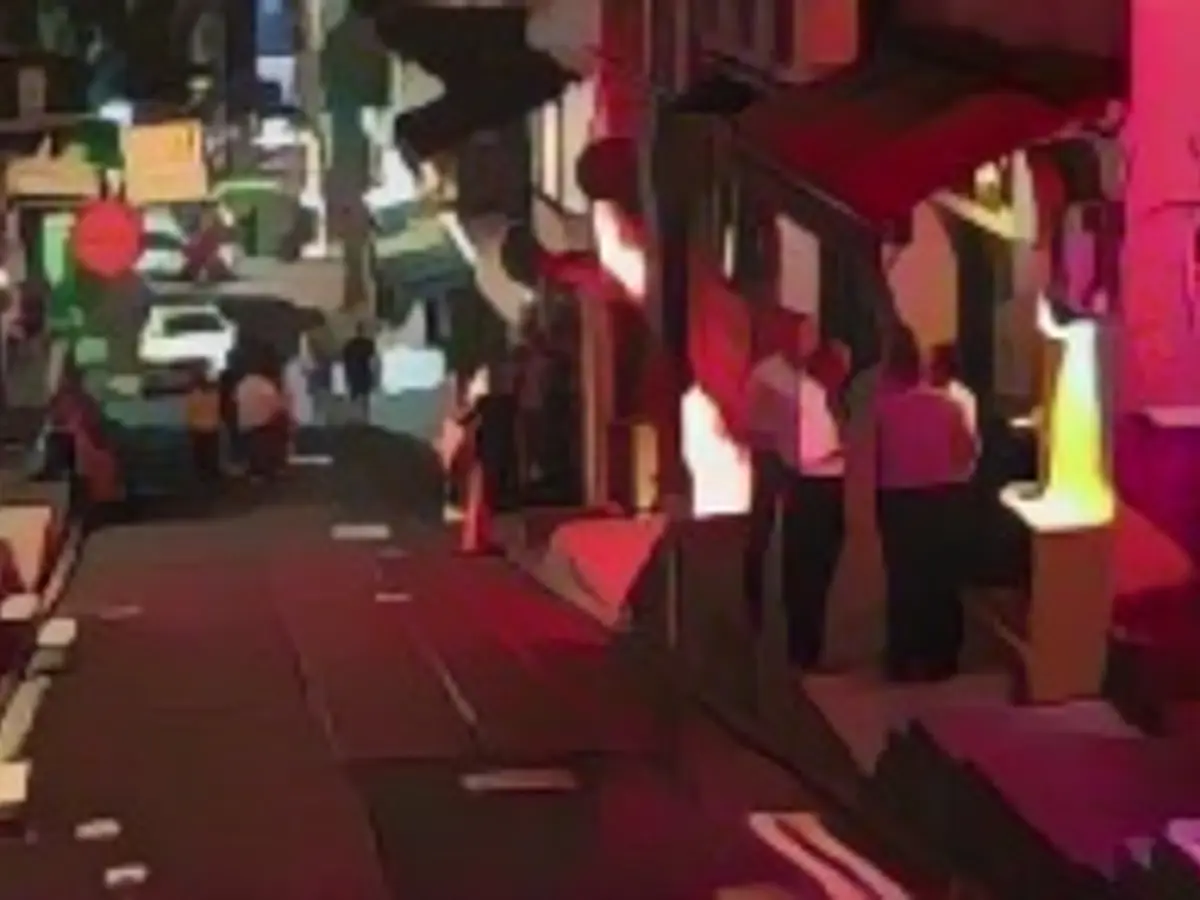 Shoppers outside a store in Hong Kong on October 5, 2021