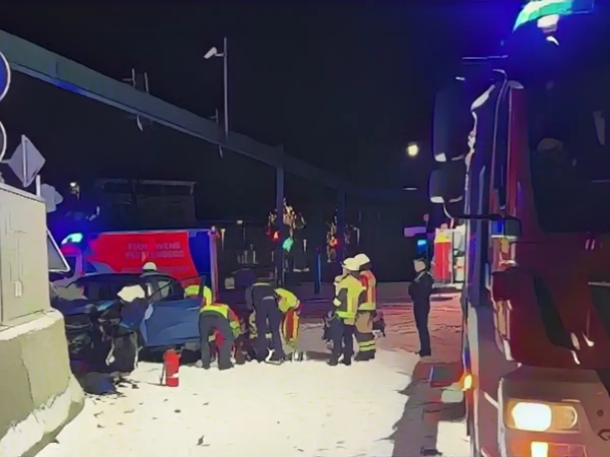 A chilling scene: emergency services at the wrecked SUV