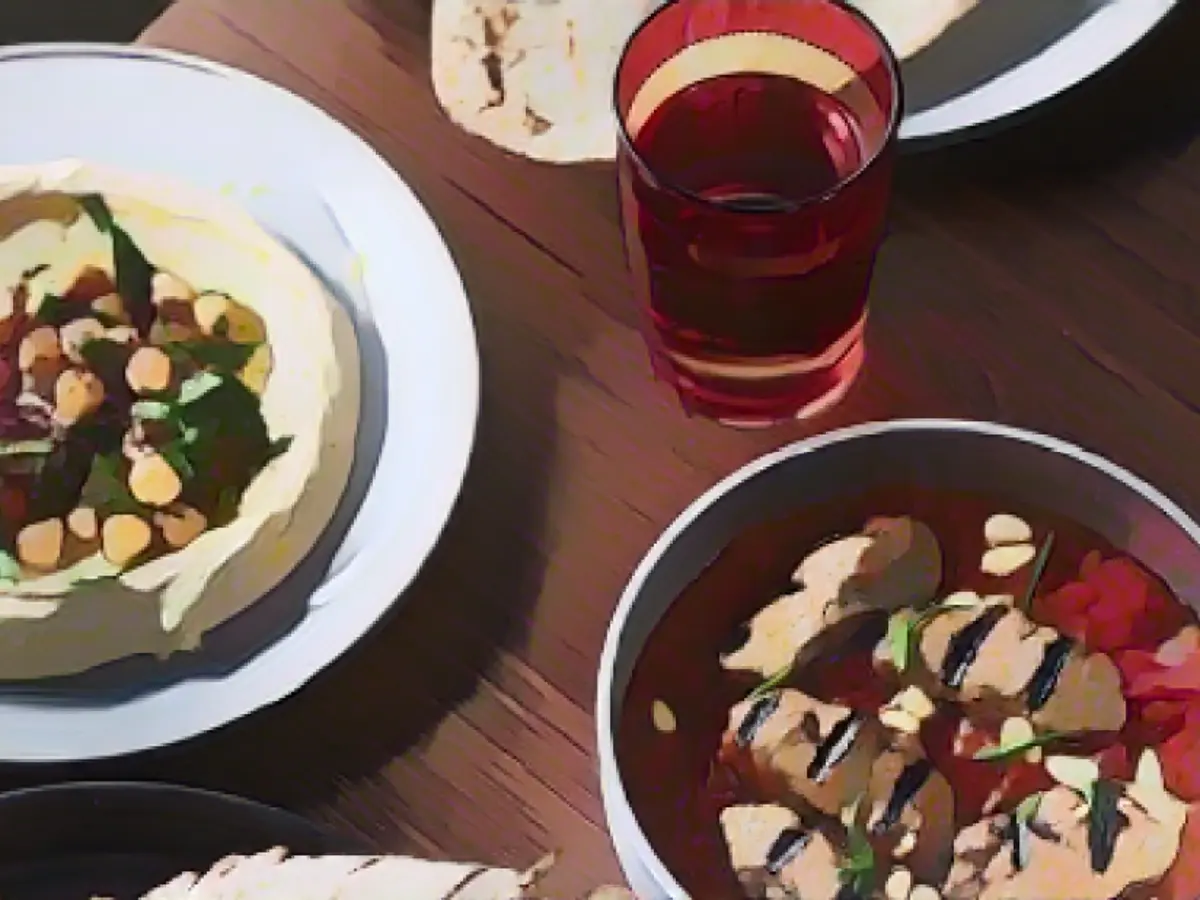 Zu den köstlichen Gerichten im Alarnab gehören Hindi-Kebab (Bild rechts), ein Lamm- und Tomatengericht.