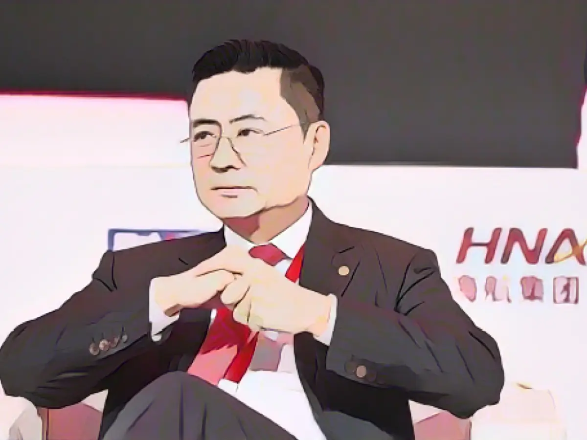 Adam Tan, CEO of HNA Group, attending a conference in Beijing, November 2017 In November 2017, Adam Tan, CEO of HNA Group, attended a conference in Beijing.