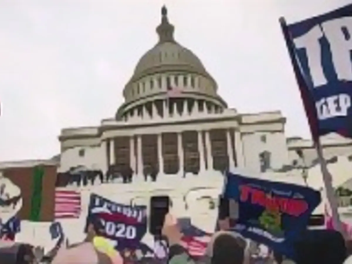 Pro-Trump-Anhänger stürmen das US-Kapitol nach einer Kundgebung mit Präsident Donald Trump am 6. Januar 2021 in Washington, D.C.