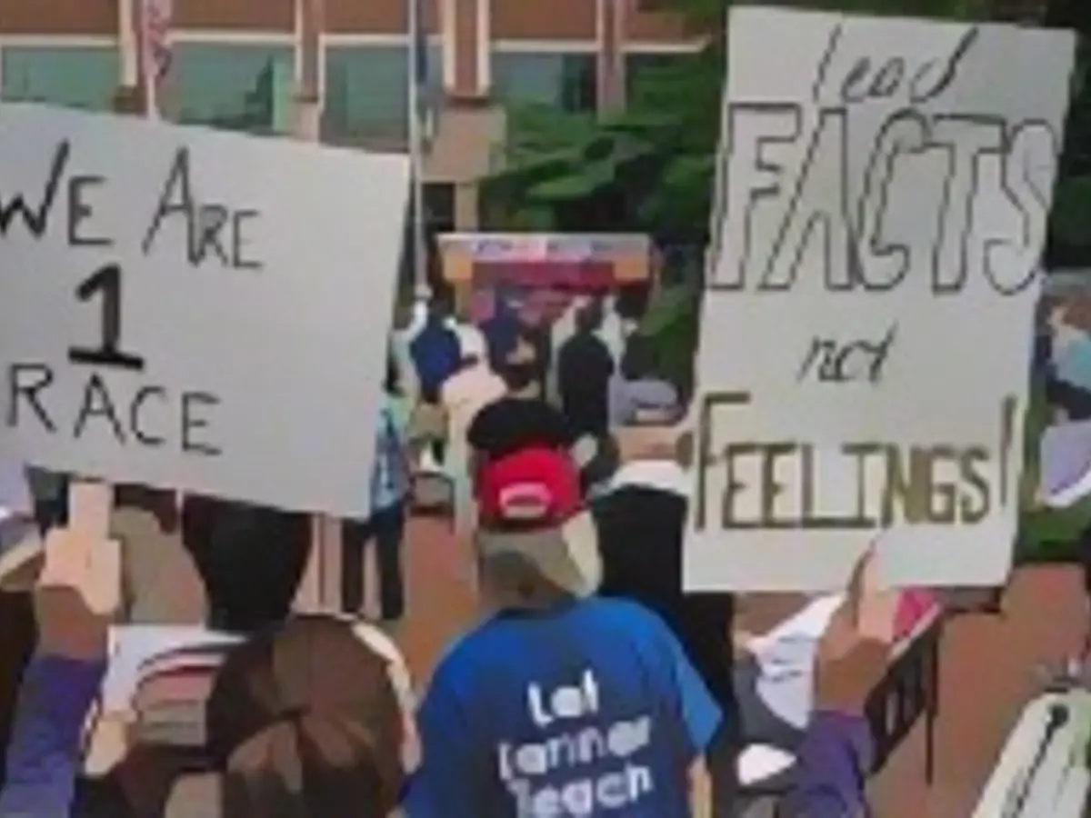 During a rally against critical race theory (CRT) being taught in schools at the Loudoun County Government Center in Leesburg, Virginia, on June 12, 2021, people hold up signs. – 'Are you ready to take back our schools?' shouted the Republican activist Patti Mendez at a rally opposing anti-racism teachings, which critics like herself argue train white children to see themselves as oppressors. 'Yes!' was the one-voice response from hundreds of demonstrators who gathered near Washington to confront the latest battleground in America's ongoing culture wars over critical race theory. The term 'critical race theory' defines a perspective that originated at American law schools in the late 1970s and views racism as a system dependent on laws and institutions, rather than at the level of individual prejudices. Critics use it as a catch-all phrase to attack teachers' efforts to confront dark moments in American history, such as slavery and segregation, and to challenge racist stereotypes. During a rally against critical race theory (CRT) being taught in schools at the Loudoun County Government Center in Leesburg, Virginia, on June 12, 2021, people hold up signs. – "Are you ready to take back our schools?" shouted the Republican activist Patti Mendez at a rally opposing anti-racism teachings, which critics like herself argue train white children to see themselves as oppressors. "Yes!" was the one-voice response from hundreds of demonstrators who gathered near Washington to confront the latest battleground in America's ongoing culture wars over critical race theory. The term "critical race theory" defines a perspective that originated at American law schools in the late 1970s and views racism as a system dependent on laws and institutions, rather than at the level of individual prejudices. Critics use it as a catch-all phrase to attack teachers' efforts to confront dark moments in American history, such as slavery and segregation, and to challenge racist stereotypes. (Photo by Andrew Caballero-Reynolds/AFP) (Photo by Andrew Caballero-Reynolds/AFP via Getty Images)