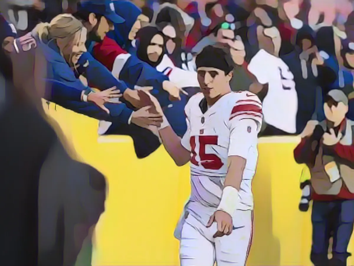 Fans elated after witnessing an NFL game between the Washington Commanders and New York Giants at FedEx Field on November 19, Landover, Maryland.