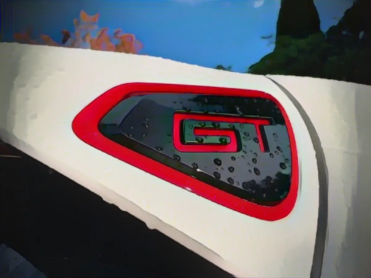 The expressive roof edge spoiler is a GT feature.
