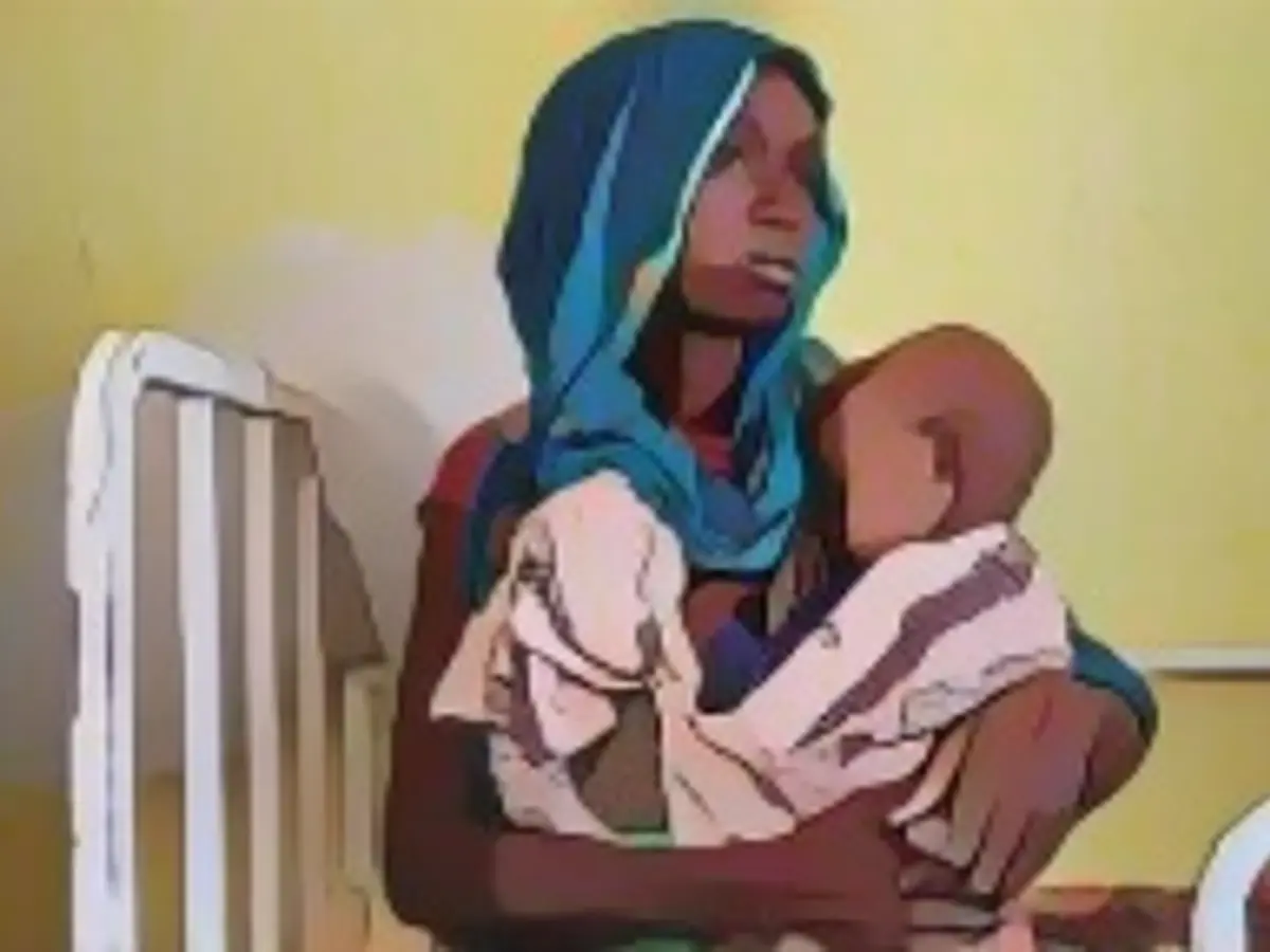 A woman caring for an undernourished child in Kairafo, Ethiopia, in April 2022.