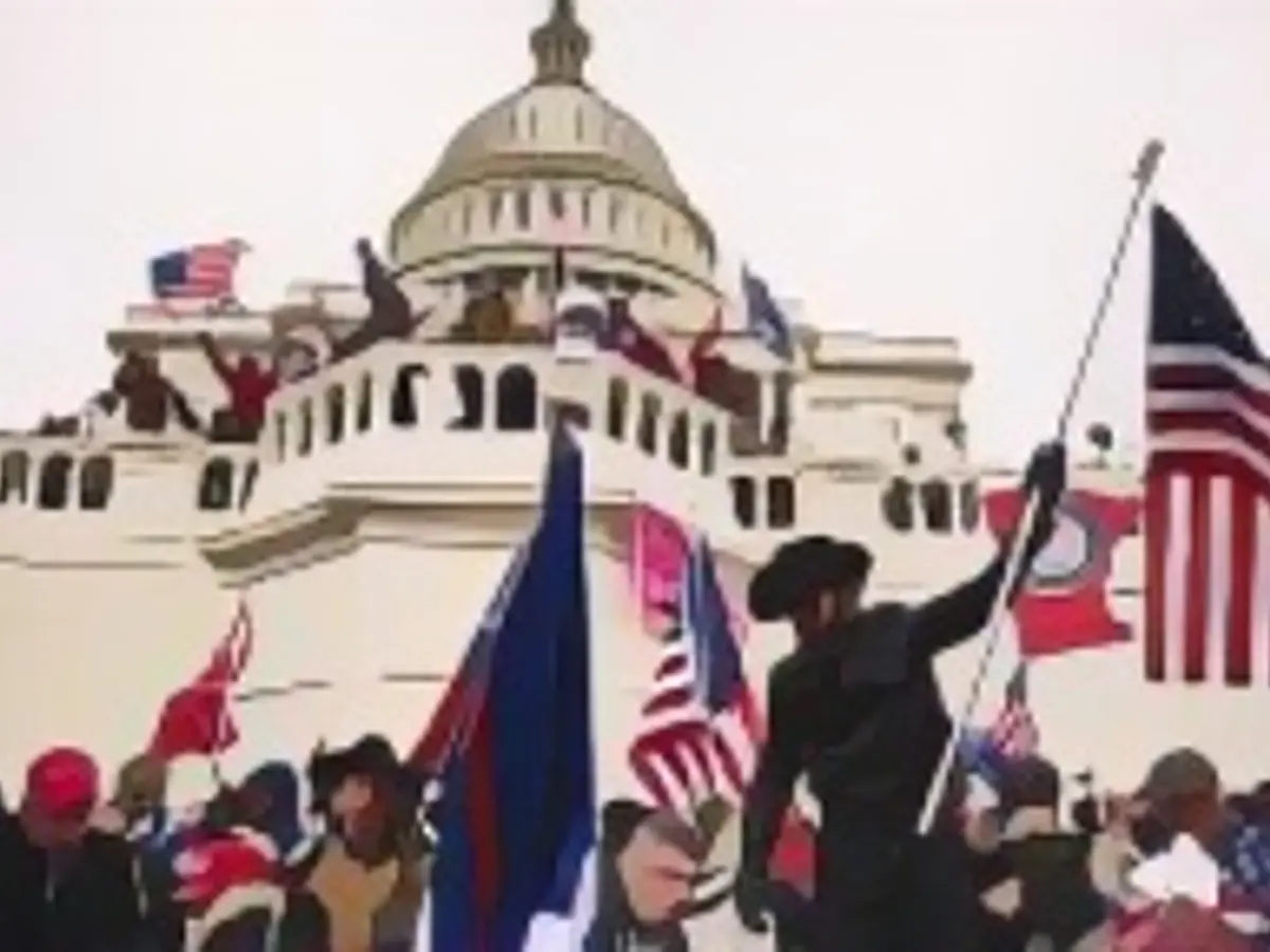 Pro-Trump-Anhänger stürmen das US-Kapitol nach einer Kundgebung mit Präsident Donald Trump am 6. Januar 2021 in Washington, D.C.