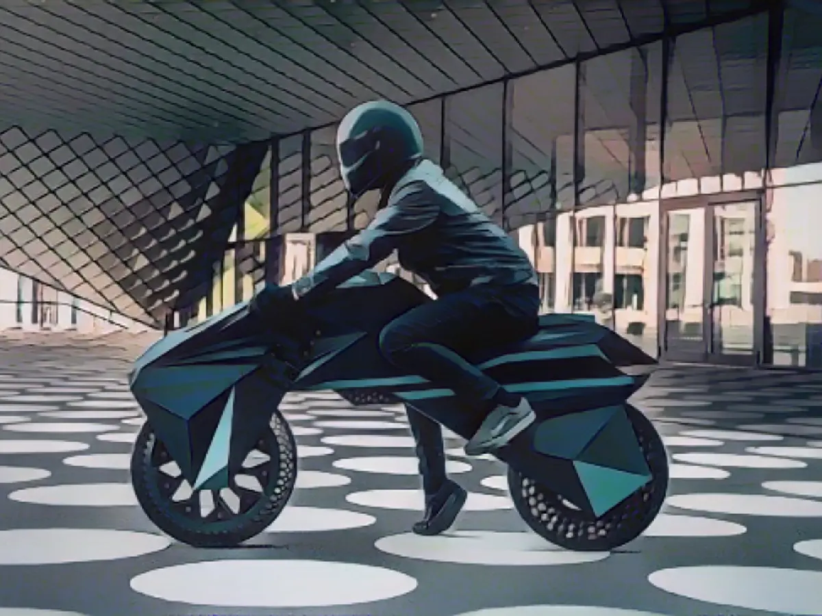 Нет, это не сцена из научно-фантастического фильма... Это первый в мире полностью напечатанный на 3D-принтере и функционирующий электрический мотоцикл.