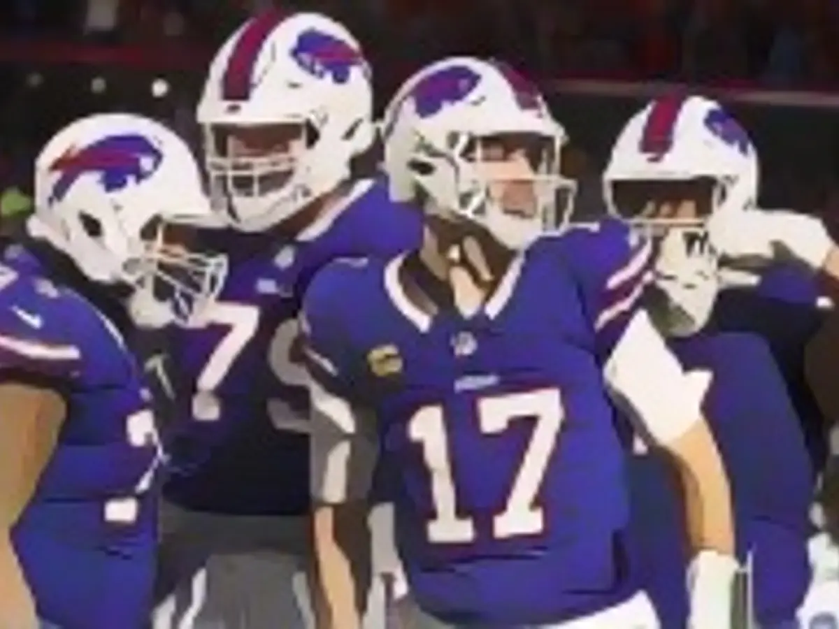 Buffalo Bills quarterback Josh Allen (17) celebrates with his teammates after scoring a touchdown against the Dallas Cowboys in the second quarter of an NFL football game on Sunday, Dec. 17, 2023, in Orchard Park, N.Y. (AP Photo/Jeffrey T. Barnes Buffalo Bills quarterback Josh Allen celebrates with his teammates after scoring a touchdown against the Dallas Cowboys.