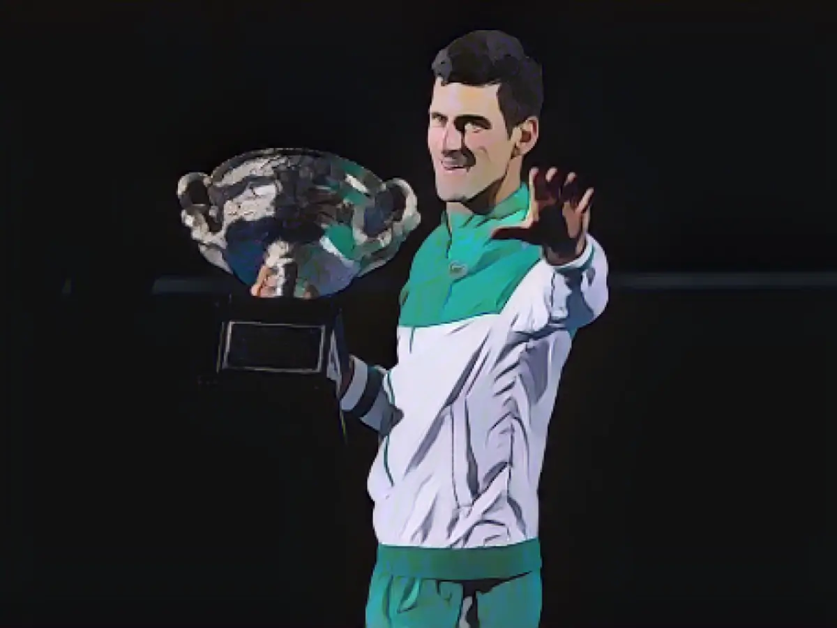 Djokovic celebra a vitória no Open da Austrália, em Melbourne Park, a 21 de fevereiro de 2021.