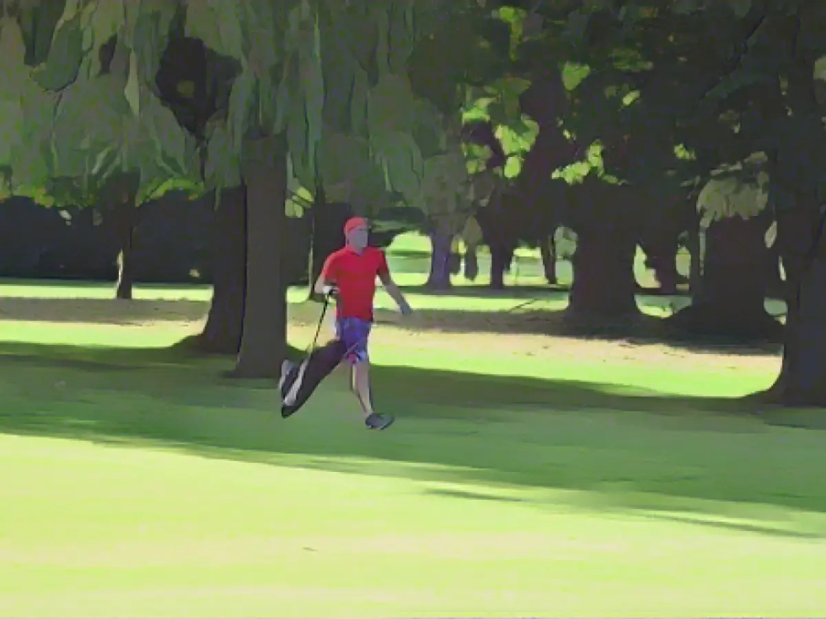 Jeffs no campo durante a sua tentativa de recorde de velocidade no golfe.