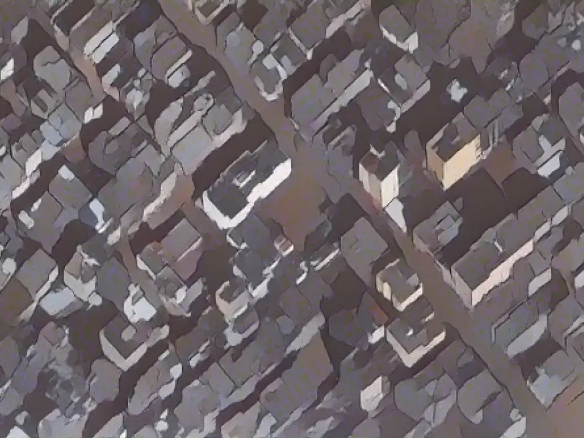 Uydu görüntüleri 15 Aralık'ta yerle bir edilen hastane alanını gösteriyor.