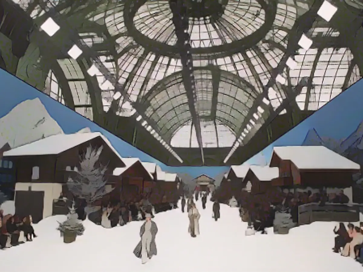 Gösterinin set tasarımı konukları Paris'teki Grand Palais'den bir dağ köyüne taşıdı.
