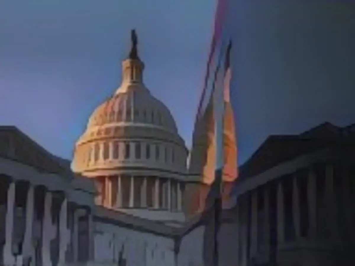 Внешний вид Капитолия США на закате в Вашингтоне, США, 13 декабря 2022 года.