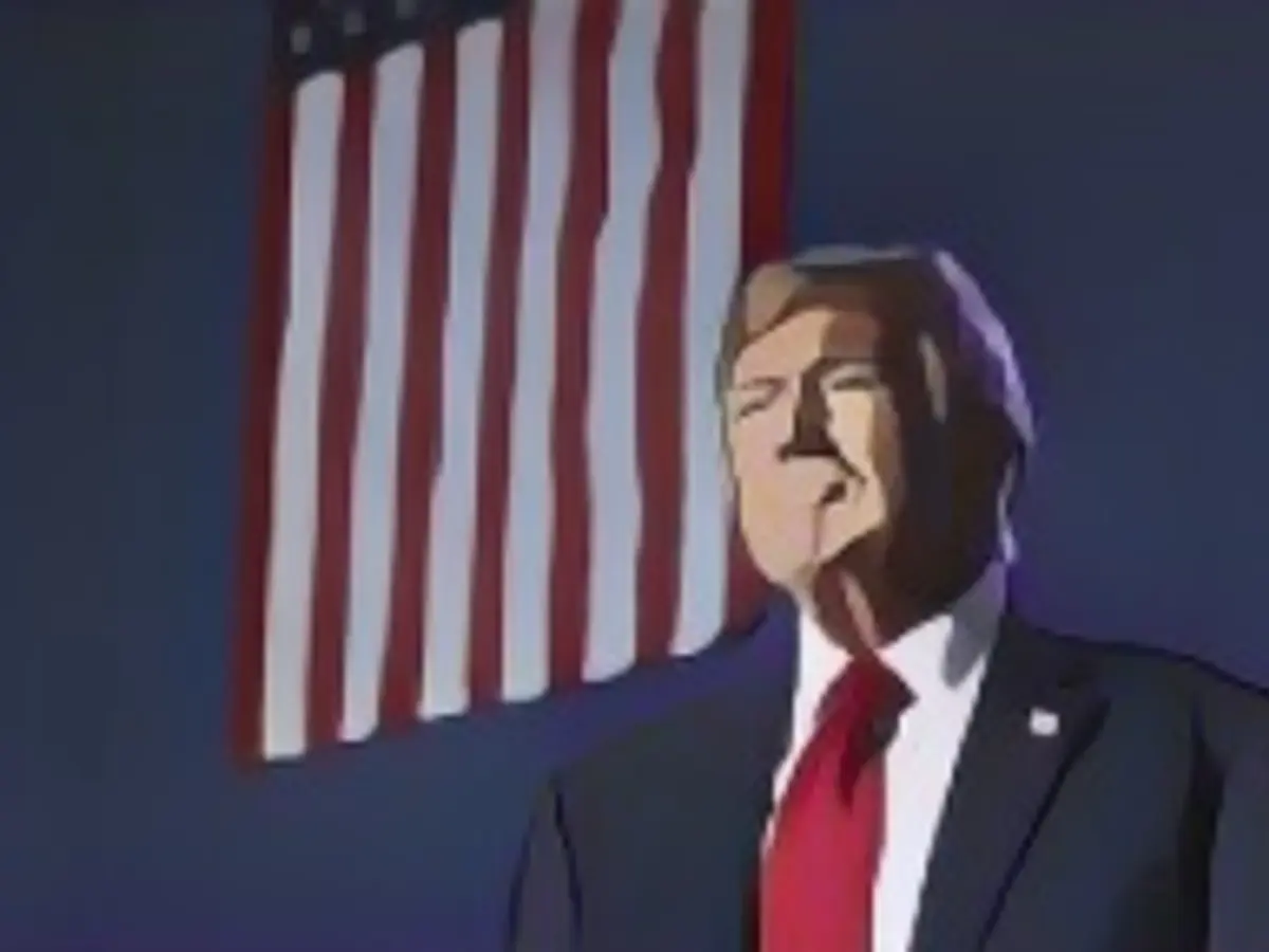 Donald Trump salută mulțimea la un miting de campanie, pe 16 decembrie, la Durham.