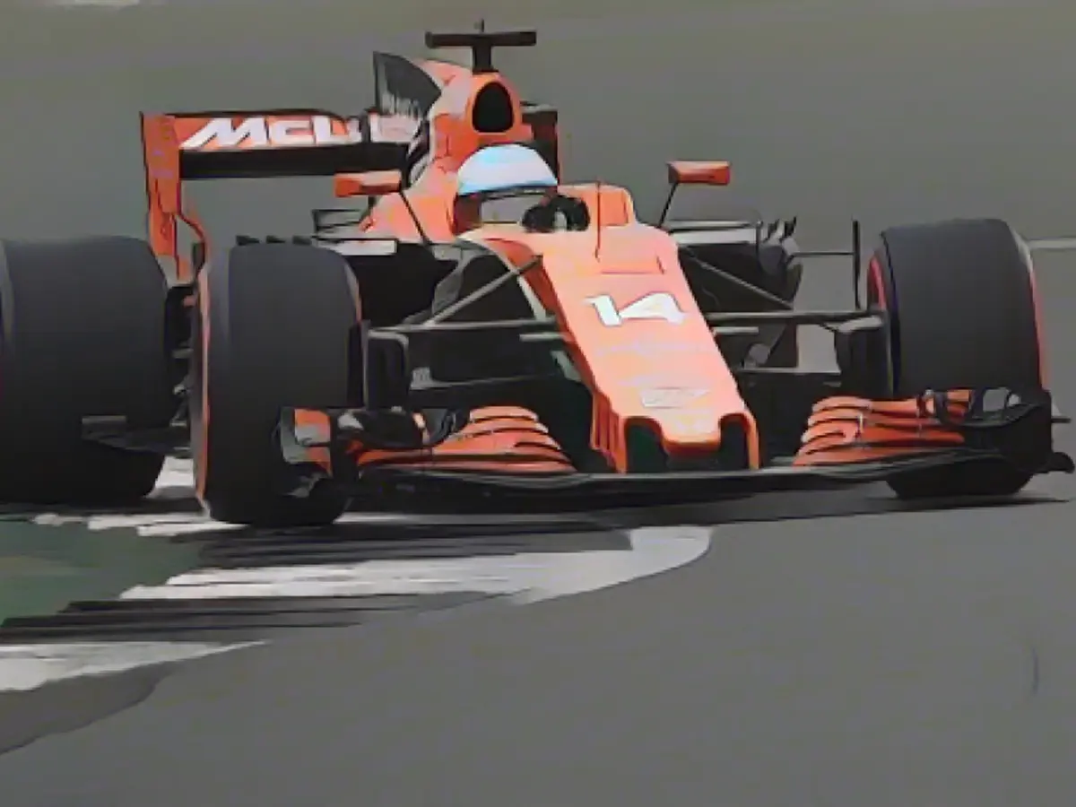 Alonso en action lors du Grand Prix de Grande-Bretagne 2017 pour McLaren. L'Espagnol - une figure populaire de la Formule 1 - a enduré quelques saisons torrides.