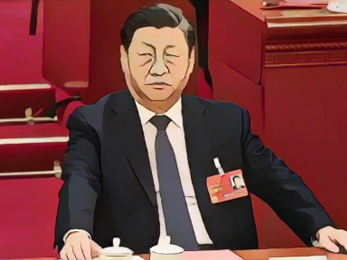 Председатель КНР Си Цзиньпин присутствует на четвертом пленарном заседании Всекитайского собрания народных представителей (ВСНП) в Большом зале народных собраний в Пекине 11 марта 2023 года. GREG BAKER/Pool via REUTERS