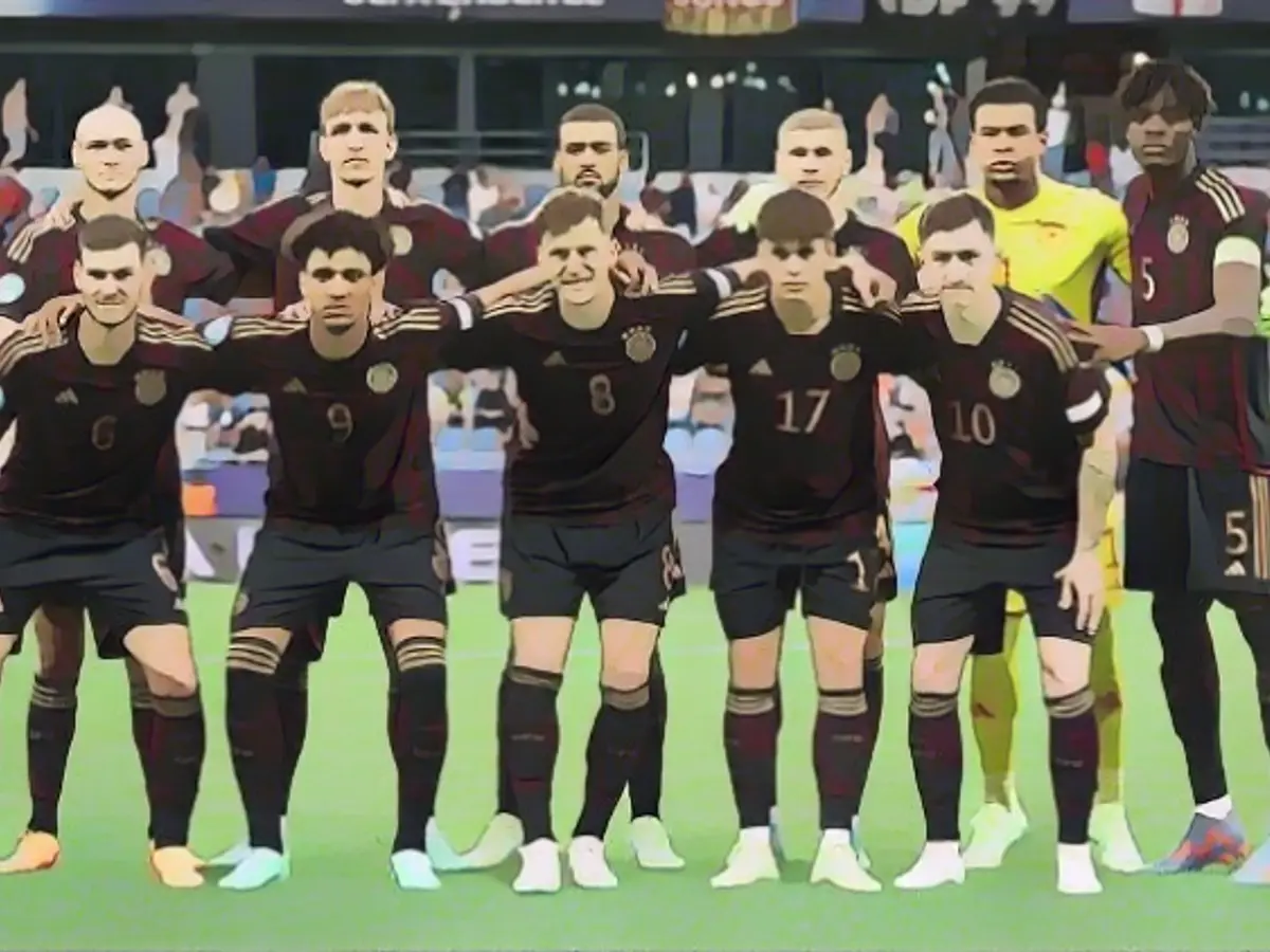 Bisseck (standing, far right) last summer as captain of the German U21 team.