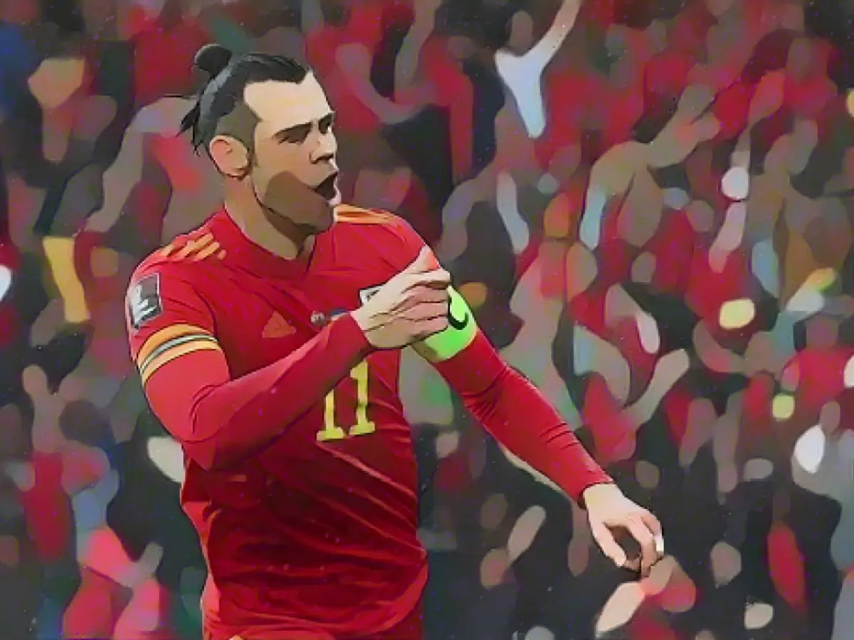 Bale sărbătorește în timpul victoriei Țării Galilor împotriva Ucrainei.