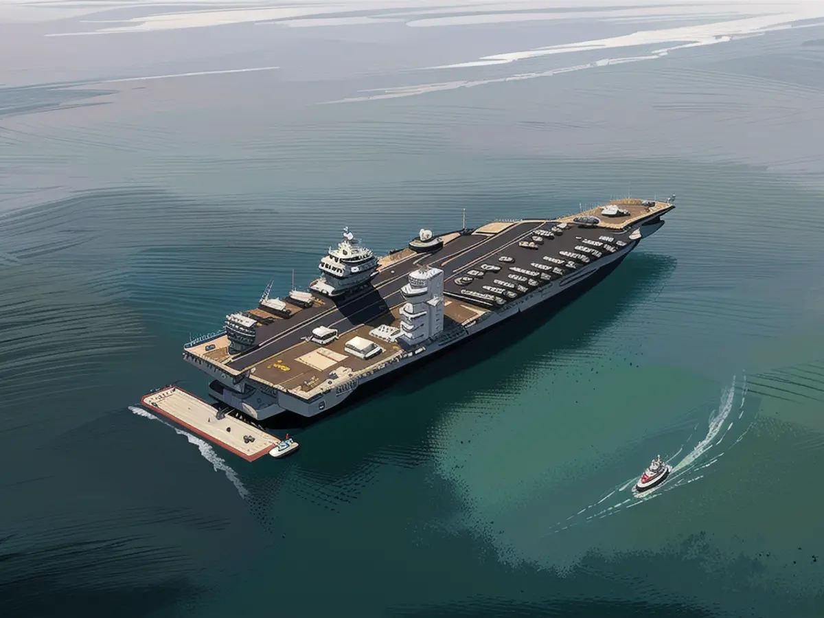 Der amerikanische Flugzeugträger USS Gerald R. Ford ist aus der Luft zu sehen, wie er am 18. September 2023 in Italien im Golf von Triest vor Anker geht.