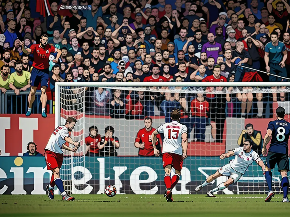 Harry Kane schießt einen Elfmeter und bringt Bayern München in Führung.