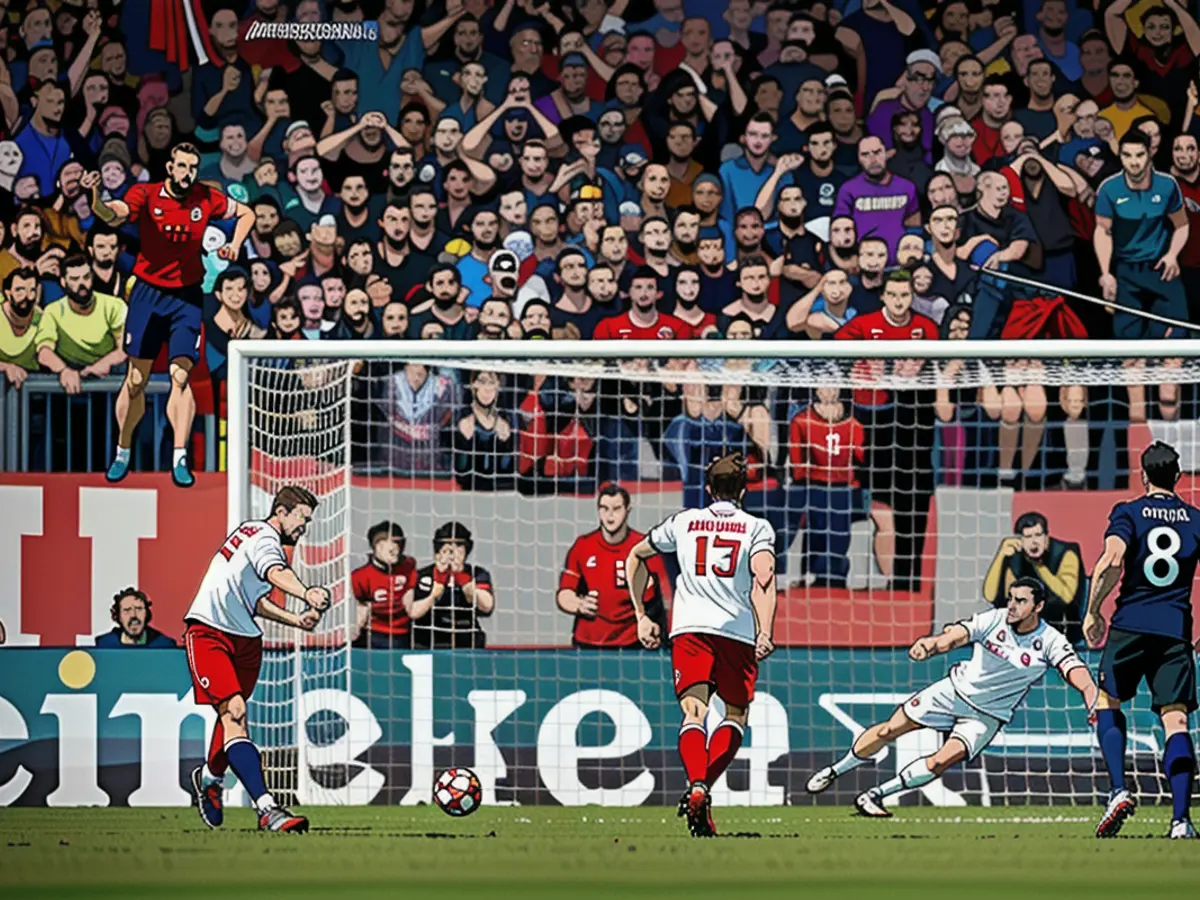 Harry Kane scores a penalty to give Bayern Munich the lead in the game.