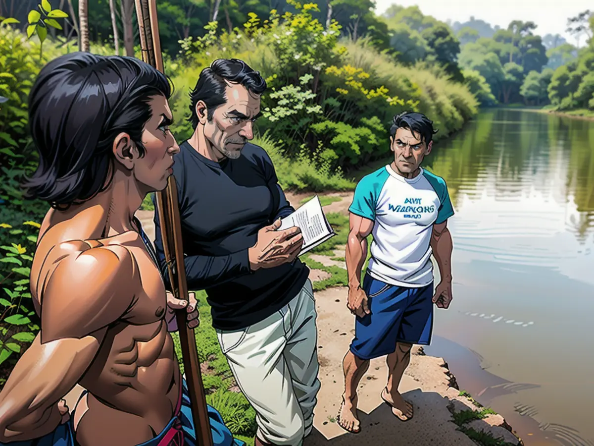 Der langjährige Auslandskorrespondent Dom Phillips spricht mit zwei indigenen Männern in Aldeia Maloca Papiú im brasilianischen Bundesstaat Roraima im Jahr 2019. Phillips wurde während der Recherche für ein Buch im brasilianischen Amazonasgebiet im Javari-Tal vermisst und später zusammen mit dem angesehenen Indigena-Experten Bruno Pereira tot aufgefunden.