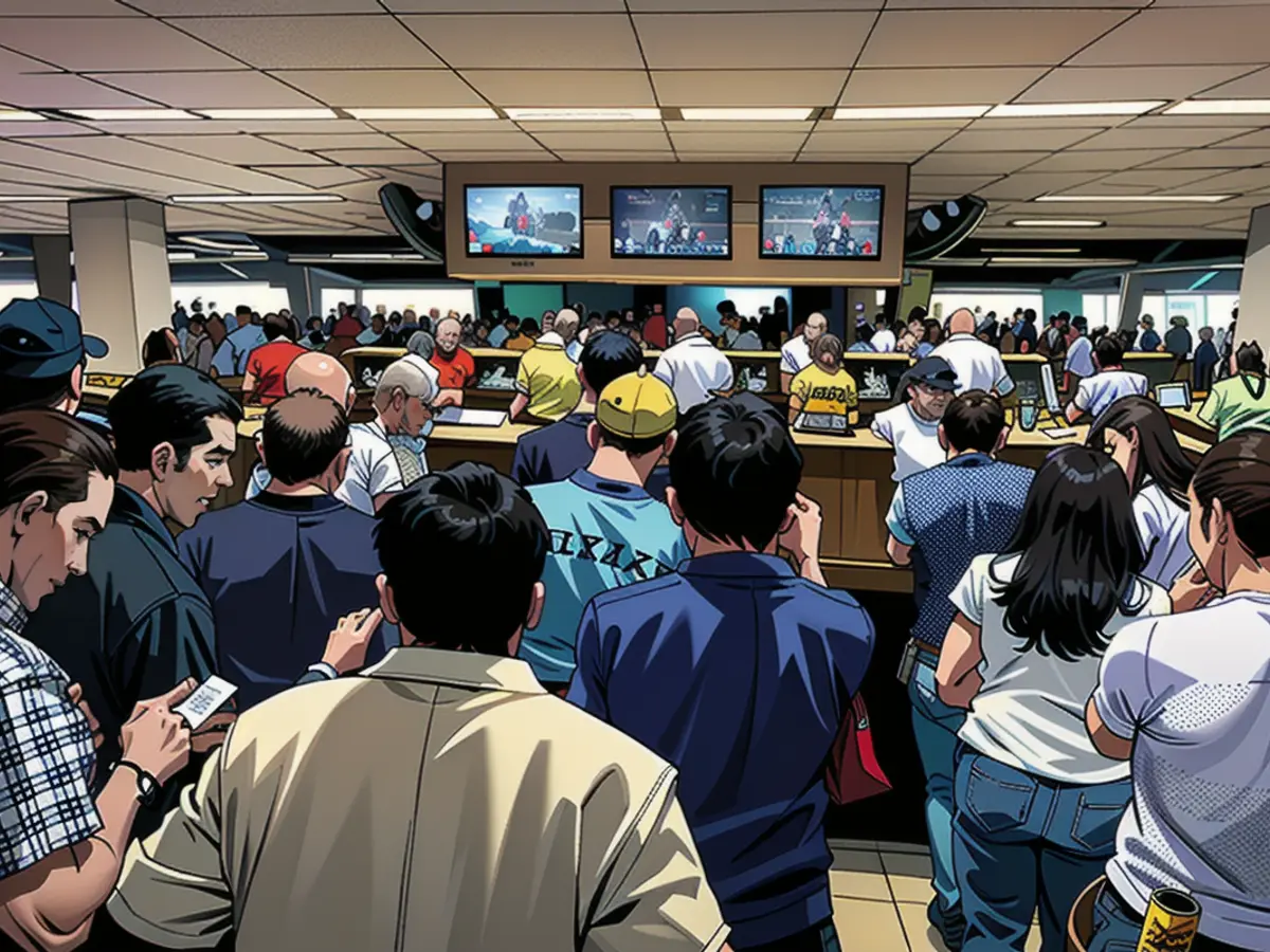 Fans line up at the betting booth prior to the 155th running of the Belmont Stakes at Belmont Park in 2023.