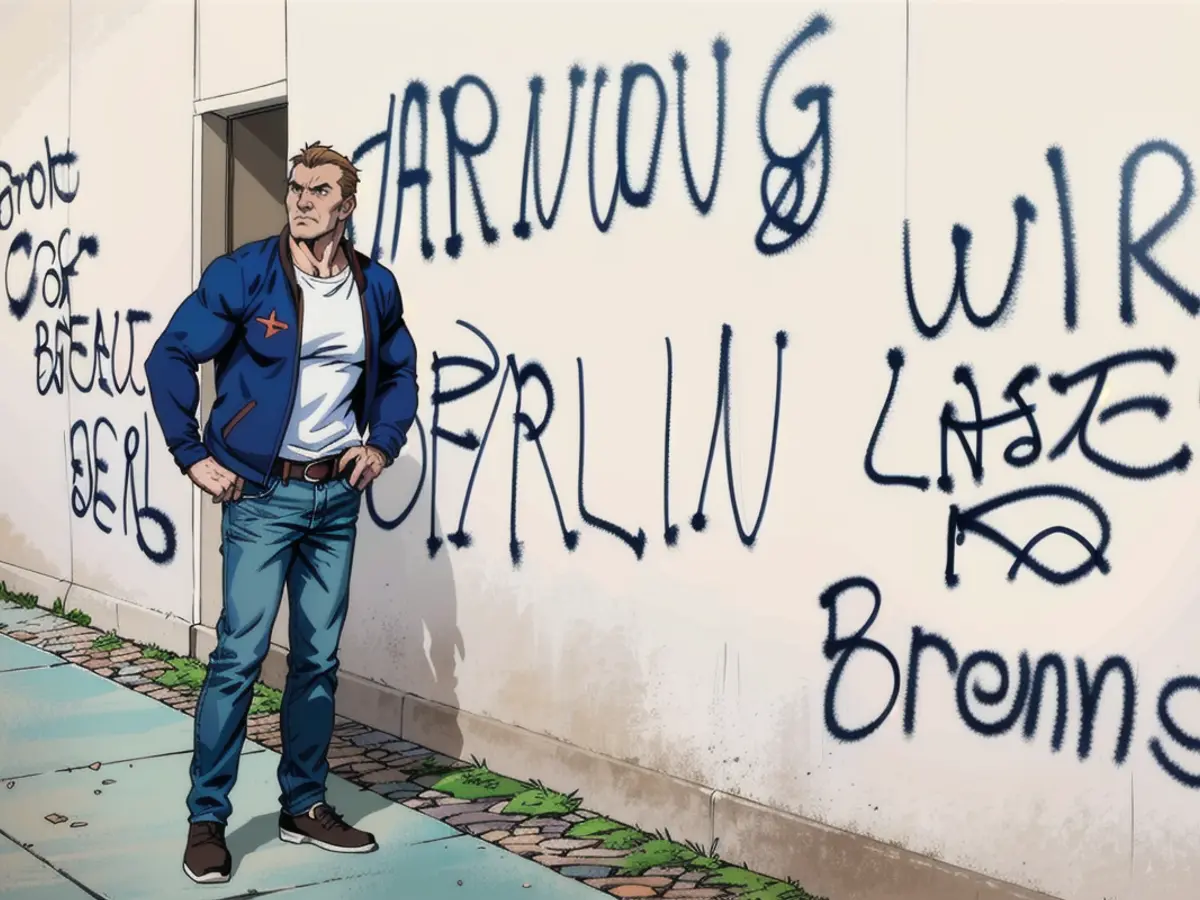 Carsten Spallek devant les graffitis sur la façade de l'hôtel de ville