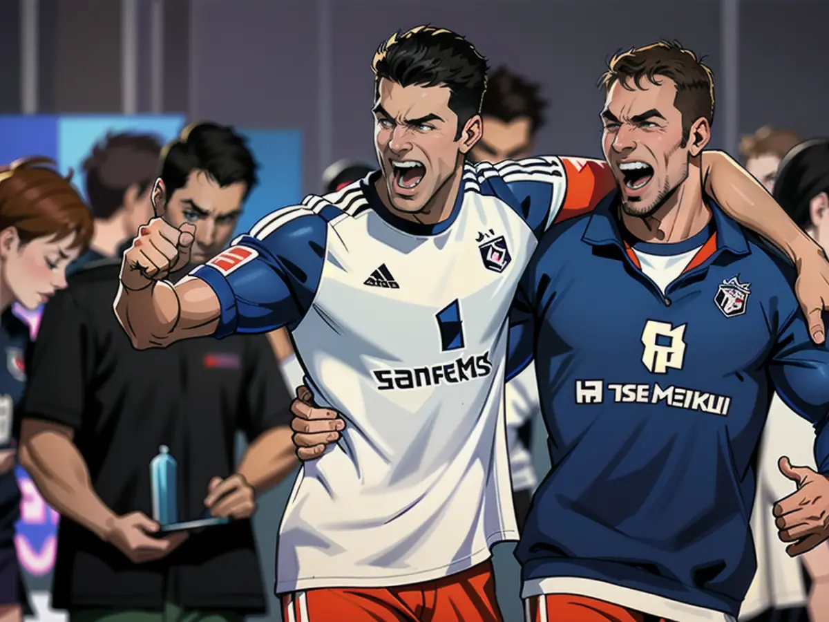 Les stars du HSV Robert Glatzel (g.) et Jonas Meffert célèbrent la victoire dans le derby contre...