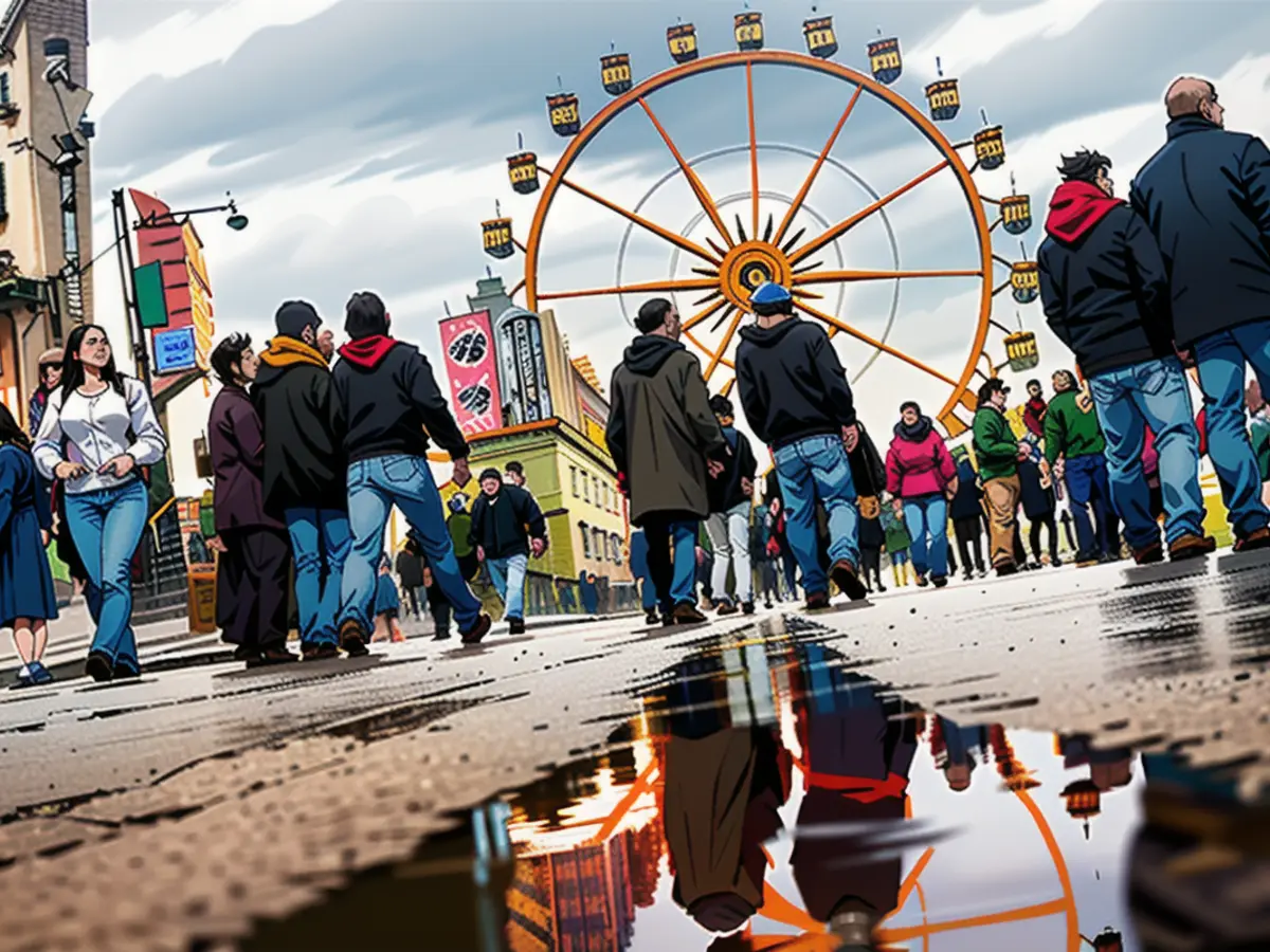 Visiteurs du festival de printemps - pluvieux - à Munich