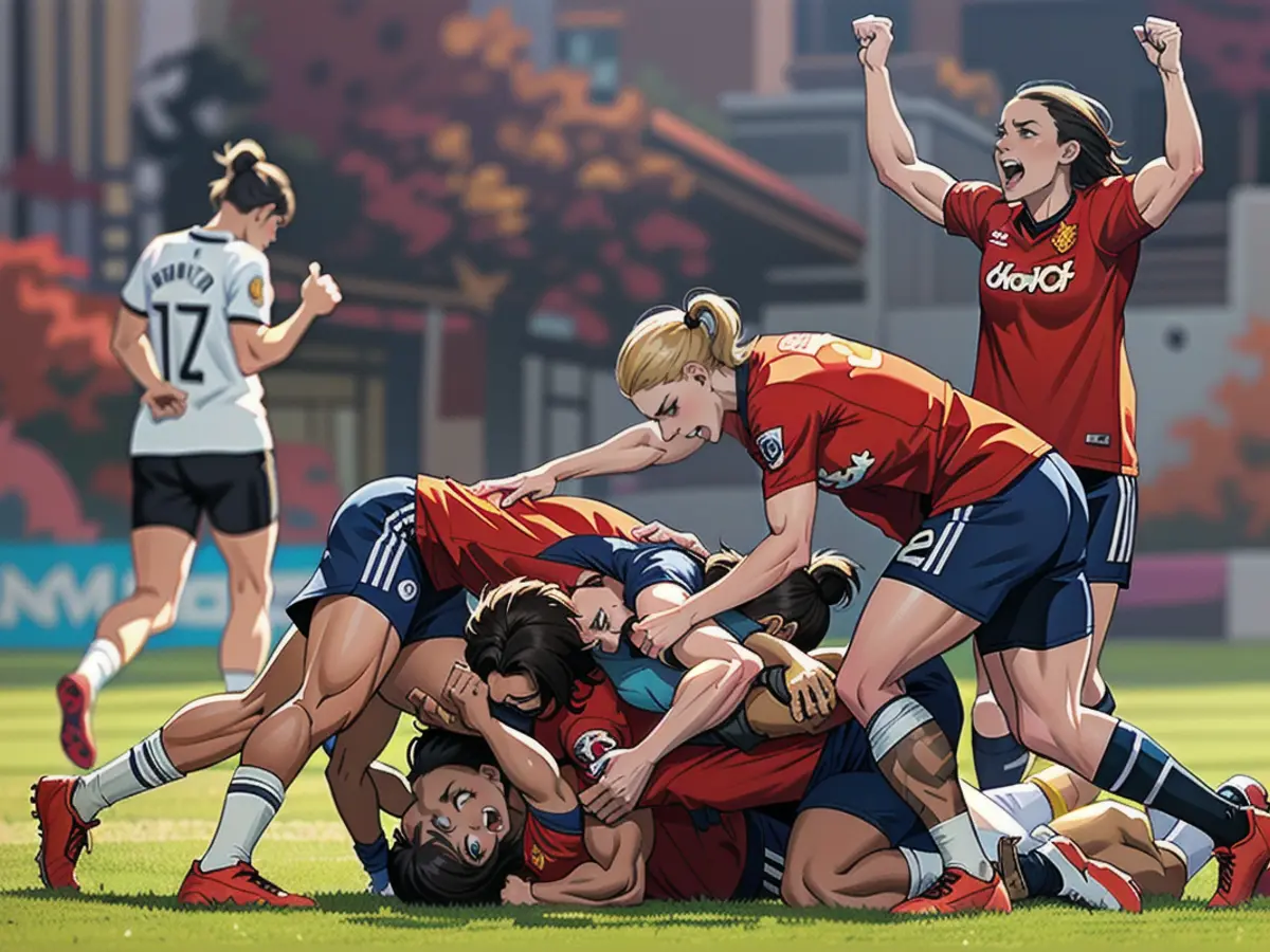 Rachel Williams, on the ground, was mobbed by her teammates after scoring United's second goal.