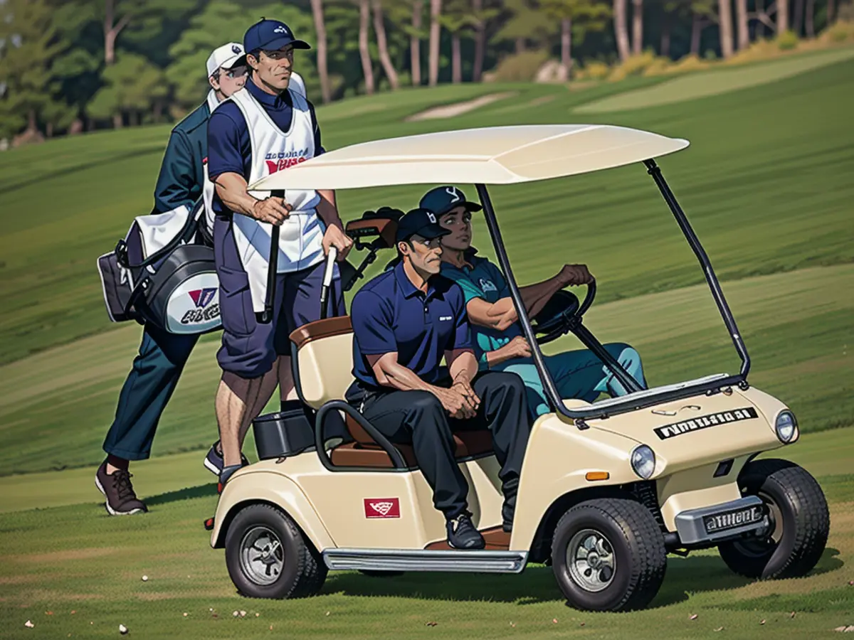 LA QUINTA, CA - NOVEMBER 27:  Tiger Woods and caddie Steve Williams ride up the fourteenth fairway in a golf cart during the final day of the Skins Game at the Trilogy Golf Club on November 27, 2005 in La Quinta, California.  (