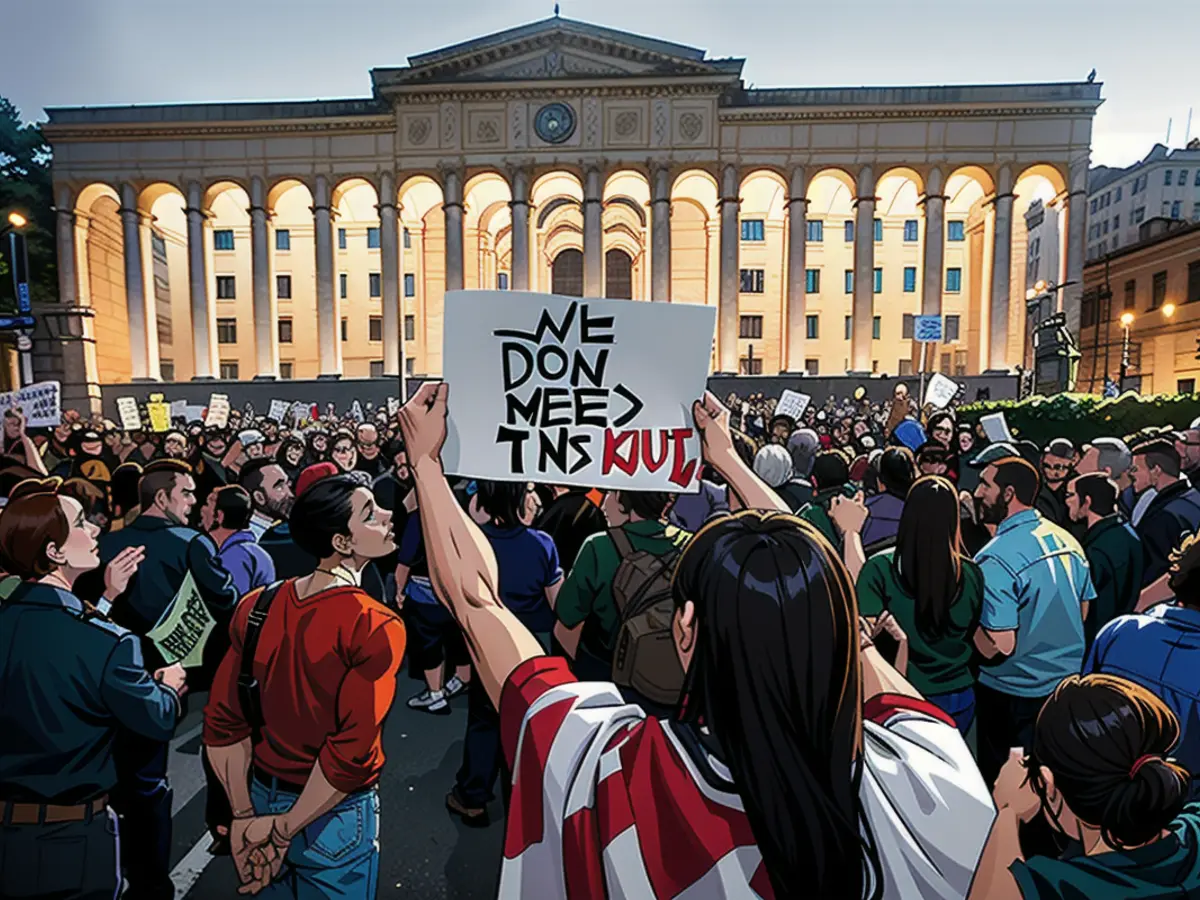 Rund 50.000 Demonstranten versammelten sich am Sonntag in Tiflis, um gegen das vorgeschlagene Gesetz zu protestieren.