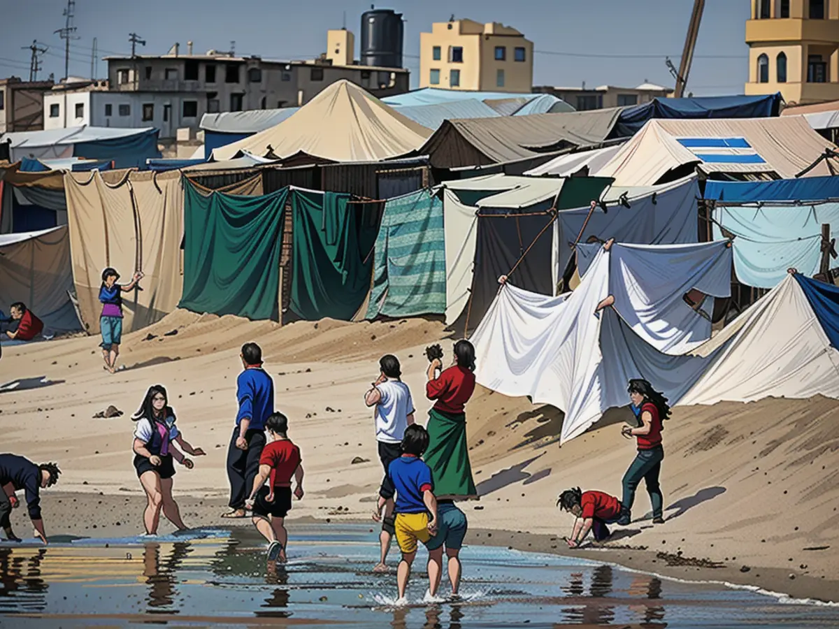 Palästinenser springen bei heißem Wetter in Rafah, Gaza, am 19. April 2024 ins Wasser, um sich abzukühlen.