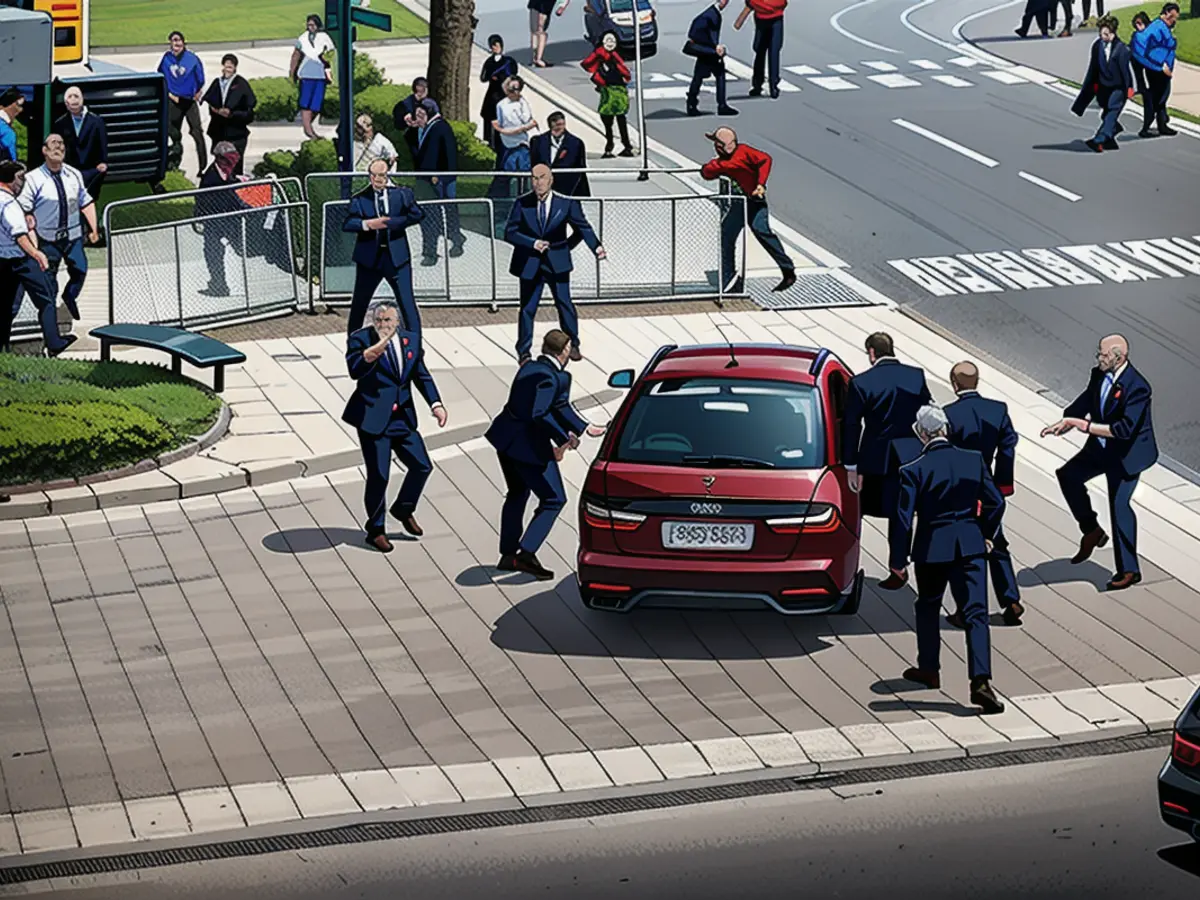 Sicherheitsbeamte transportieren den slowakischen Premierminister Robert Fico in einem Auto nach einer Schießerei nach einer slowakischen Regierungssitzung in Handlova, Slowakei, 15. Mai 2024. REUTERS/Radovan Stoklasa